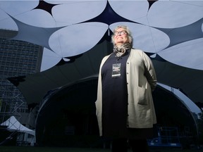 Jazzfest general manager Catherine O'Grady stands in front of the main stage in Confederation Park, where volunteers were setting up for the festival before it started on June 24.