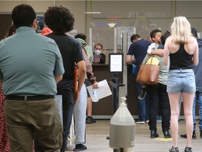 Many people in the lineup at the Ottawa passport office on Wednesday had left by mid-afternoon, but those that had brought chairs and been prepared for the long wait seemed to be at least moving a couple of hours before the office was to close.