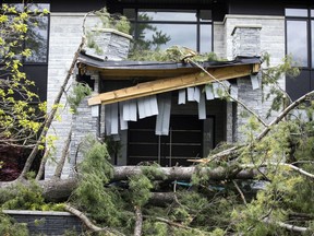This photo shows the damage to a home in the Pineglen neighbourhood following the derecho on May 21.