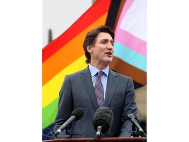 Along with other politicians and dignitaries, Prime Minister Justin Trudeau was on hand for the raising of the Pride flag on Parliament Hill Wednesday.