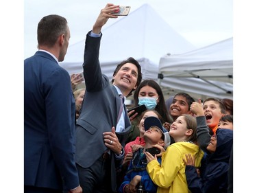 Along with other politicians and dignitaries, Prime Minister Justin Trudeau was on hand for the raising of the Pride flag on Parliament Hill Wednesday.
Kids from the Dearcroft Montessori school in Oakville could barely contain their excitement when the PM stopped for selfies with them after the ceremony.