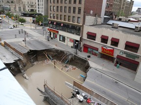 A sinkhole in June 2016 swallowed a chunk of Rideau Street and a minivan as LRT workers excavated soft ground in the area to build the Confederation Line.