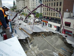 The massive sinkhole on Rideau Street was just one of the failures that plagued construction of the Confederation Line.