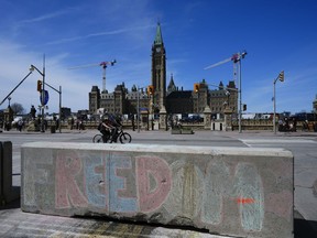 Chalk art remains in downtown Ottawa on May 1, 2022, following a protest. Events are set to take place in Ottawa in late June through the rest of the summer for what organizers say are to protest remaining COVID-19 pandemic-era restrictions.