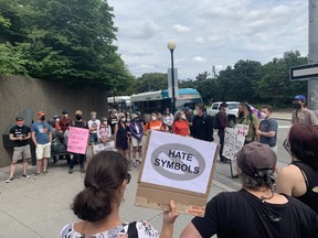 Counter-protesters gathered in front of the Oscar Peterson statute on Elgin Street on Thursday in anticipation of "freedom" demonstrators on Canada Day.