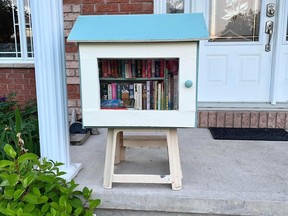 Stittsville resident Wendy Chaytor was told by Ottawa's bylaw department to move her Little Library -- a decision that was revised Monday. Chaytor moved the community library from the curb to her porch after a complaint.