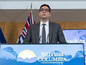 British Columbia's Attorney General David Eby speaks to reporters in Vancouver on June 15, 2022.