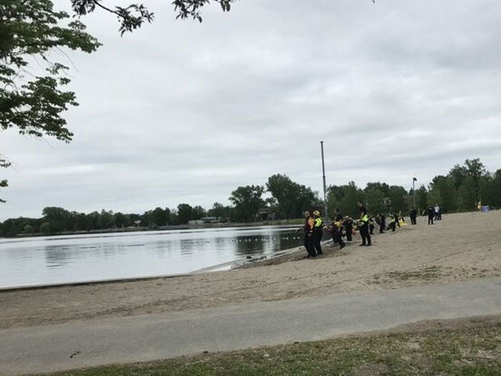 ottawa fire services pulled a pair of swimmers a buoy about 200 metres off britannia beach wednesday.