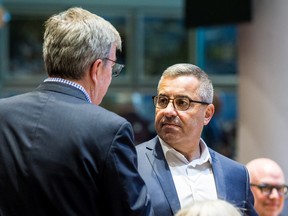 Steve Kanellakos, city manager, talks with Mayor Jim Watson before the start of an in-camera Ottawa Council meeting back in 2020.