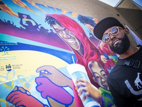 An unveiling of a mural made by and for the youth of Lowertown in solidarity with the Black Lives Matter movement took place Saturday, July 16, 2022, at the back side of the Rideau Street Loblaws. Kalkidan Assefa, known as DRPN Soul, a local artist and muralist, worked with the youth to create a stunning mural that is on display now.