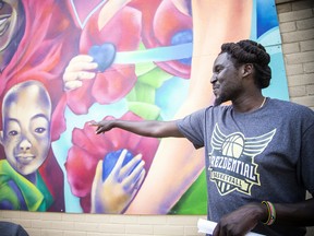 An unveiling of a mural made by and for the youth of Lowertown in solidarity with the Black Lives Matter movement took place Saturday, July 16, 2022, at the back side of the Rideau Street Loblaws. Manock Lual, CEO of Prezdential Basketball, joked with some youngsters at the even Saturday.