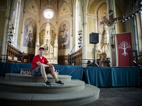 File photo: The United People of Canada organization is in the process of purchasing and renovating the historic St. Brigid’s church. William Komer, a member of the organization’s board of directors, sits inside the church.