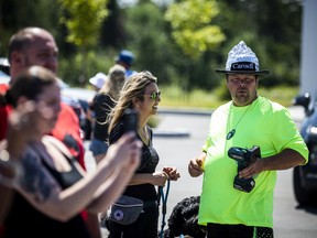 A group of 'freedom' supporters gathered together in the west end of Ottawa  in the Structube parking lot on Saturday, July 23, 2022. The group left the lot midday and did a slow-roll protest in support of the Dutch farmers along the 417. The group then met with another group of protesters outside the Dutch Embassy in Constitution Square and moved their protest around the downtown core hitting the National War Memorial, Parliament Hill and many downtown streets.