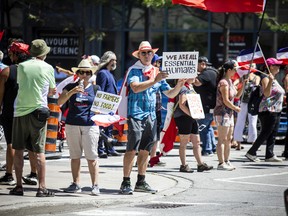 A group of 'freedom' supporters gathered together in the west end of Ottawa  in the Structube parking lot on Saturday, July 23, 2022. The group left the lot midday and did a slow-roll protest in support of the Dutch farmers along the 417. The group then met with another group of protesters outside the Dutch Embassy in Constitution Square and moved their protest around the downtown core hitting the National War Memorial, Parliament Hill and many downtown streets.