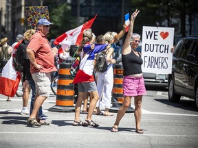 A group of 'freedom' supporters gathered together in the west end of Ottawa  in the Structube parking lot on Saturday, July 23, 2022. The group left the lot midday and did a slow-roll protest in support of the Dutch farmers along the 417. The group then met with another group of protesters outside the Dutch Embassy in Constitution Square and moved their protest around the downtown core hitting the National War Memorial, Parliament Hill and many downtown streets.