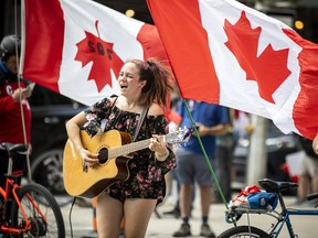 A group of 'freedom' supporters gathered together in the west end of Ottawa  in the Structube parking lot on Saturday, July 23, 2022. The group left the lot midday and did a slow-roll protest in support of the Dutch farmers along the 417. The group then met with another group of protesters outside the Dutch Embassy in Constitution Square and moved their protest around the downtown core hitting the National War Memorial, Parliament Hill and many downtown streets.