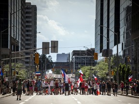 A group of 'freedom' supporters gathered together in the west end of Ottawa  in the Structube parking lot on Saturday, July 23, 2022. The group left the lot midday and did a slow-roll protest in support of the Dutch farmers along the 417. The group then met with another group of protesters outside the Dutch Embassy in Constitution Square and moved their protest around the downtown core hitting the National War Memorial, Parliament Hill and many downtown streets.