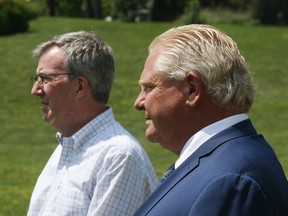 Ottawa Mayor Jim Watson and Ontario Premier Doug Ford. "What we have in place now, while imperfect, does create a system of checks and balances between the mayor and council," said Watson in a statement Tuesday.