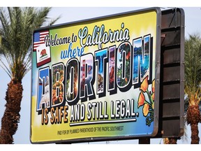 A billboard in Rancho Mirage, California, reads: 'Welcome to California where abortion is safe and still legal' on July 12, 2022. Thanks to the U.S. Supreme Court, abortion is now banned in several U.S. states.