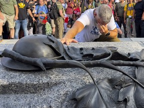 Canadian Forces veteran James Topp arrived at the National War Memorial early Thursday evening, completing a cross-country march to protest COVID-19 vaccine mandates.