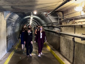 Jenna Sudds, right, MP for Kanata-Carleton, walks out of the Diefenbunker with Christine McGuire, executive director, Diefenbunker: Canada's Cold  War Museum. Sudds announced a $600,000 investment to enhance Diefenbunker visitor experience and upgrade infrastructure.