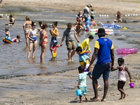 OTTAWA -- People enjoying the heat at Britannia Bay beach on Tuesday, Jul. 19, 2022 -- . ERROL MCGIHON, Postmedia