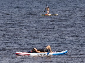 Files: People enjoying the heat at Britannia Bay