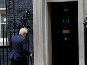 British Prime Minister Boris Johnson leaves after making a statement at Downing Street in London, Britain, July 7, 2022.