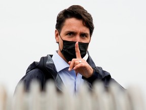 Canada's Prime Minister Justin Trudeau gestures to his staff after an election campaign stop in Richmond, British Columbia Canada September 14, 2021.