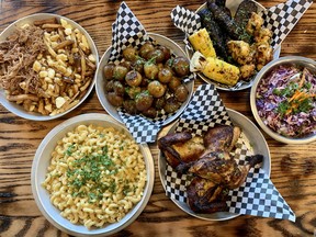 An assortment of barbecued dishes at Brine and Grill in Orleans.