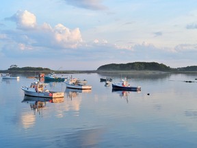 Lobster boats in Kennebunkport, Maine. In the first half of 2022, the state's travel-planning site saw a surge in interest among Quebecers, said the director of Maine’s tourism office.