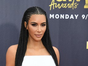 What happened when Kim Kardashian took out her cornrows? Did workplace discrimination shrivel up and die? Well, no.