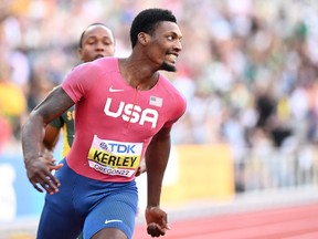 TOPSHOT - USA's Fred Kerley celebrates after crossing the finish line in first place in the men's 100m final during the World Athletics Championships at Hayward Field in Eugene, Oregon on July 16, 2022.