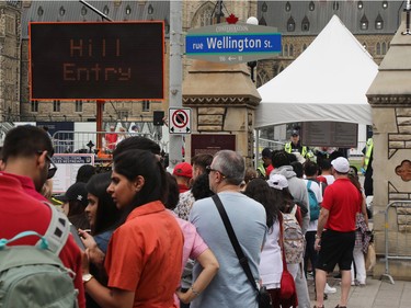 There was a lengthy lineup to enter the Parliament Hill grounds during Canada Day festivities on Friday.