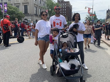 Riaz Sidi and his family were taking in the Canada Day festivities on Wellington Street on Friday.