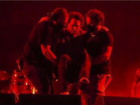 Rage Against The Machine played Friday night at Bluesfest. Lead singer Zack de la Rocha was carried on stage by his crew; de la Rocha recently broke his leg, but he clearly wasn’t going to let an injury limit his performance.