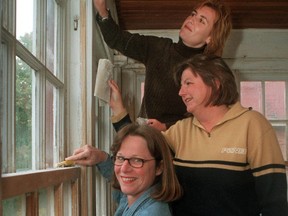 Judy Bullis, Sue Sherring and Kathleen Harris donate their time Thursday by helping out a womans' shelter in Ottawa. the three Sun gals were sanding and refinishing a sun room at the womens' shelter.