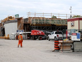 Construction of the new overpass near Booth Street and 417 highway in Ottawa Monday.