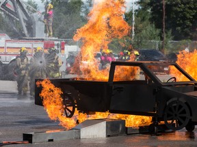 A file photo shows a simulated vehicle fire at the Ottawa Fire Services Training Centre on Industrial Avenue.