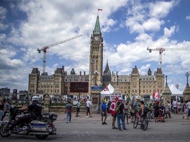 A small group of "freedom" protesters were on Wellington Street outside the gates of Parliament Hill on Saturday afternoon.