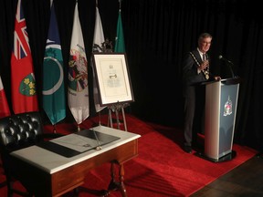 Mayor Jim Watson delivers remarks during a June 16 ceremony when The Ottawa Citizen was presented with the key to the city in recognition of more than 175 years of coverage in the community.