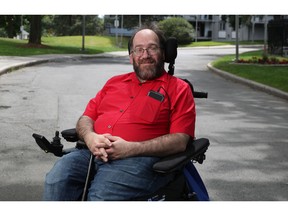 Transit and taxi user Michael Lifshitz has had to wait.  many hours for an accessible ride.  He is not alone.