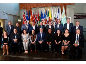 Canada's premiers and Indigenous leaders talked health care and other matters this week in Victoria, B.C. Premiers (back row L-R), Sandy Silver (Yukon), P.J. Akeeagok, (Nunavut), Scott Moe (SK), Doug Ford (Ont),Francois Legault (Que), Dennis King (PEI), Tim Houston (NS), Blaine Higgs (NB), Andrew Furey (NL and Labrador) and (front row L-R), President of Institute for the advancement of Aboriginal Women Lisa Weber, National Chief of Congress of Aboriginal Peoples Elmer St. Pierre,  Heather Stefanson (MB), Songhees Nation Chief Ron Sam, John Horgan (BC), Esquimalt Nation Chief Rob Thomas, Caroline Cochrane (NWT), Cassidy Caron (Metis National Council) and Terry Teegee (Assembly of First Nations).