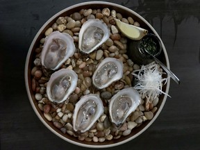 Oysters, tarragon and horseradish mignonette at Stolen Goods Cocktail Bar.
