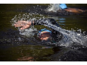 The Riverkeeper Open Water Swim race took place in the Ottawa River, starting and finishing at the Lac Deschênes Sailing Club, Sunday, August 14, 2022. 1.5K racer Michael Olsen finished the last few strokes of his race Sunday morning.
