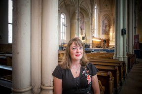 Rosie Martens, known on social media as Rosie Convoy, waits inside the former St. Brigid’s Church, where The United People of Canada await a bailiff to enforce their landlord’s eviction notice.