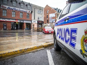 Ottawa police investigate an early morning shooting at ByWard Market on York Street, Friday. Three men were wounded and are in serious but stable condition.

ASHLEY FRASER, POSTMEDIA