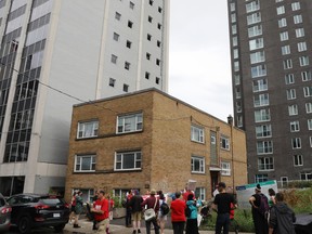 Written up in a memorandum of understanding with city staff, the developers have proposed relocation agreements for those still living at 142 Nepean St., outside of which people held a rally Tuesday.