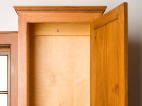 No matter how you plan to finish the outside of a cabinet, coating the inside with a clear sealer is a classy and simple way to go.