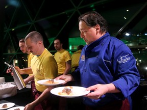 Jean-Claude Chartrand of L’Oree du Bois cooks braised veal cheek with a foie gras crust, with truffle espuma and brioche at the 2015 Gold Medal Plates was competition at the Shaw Centre in Ottawa.